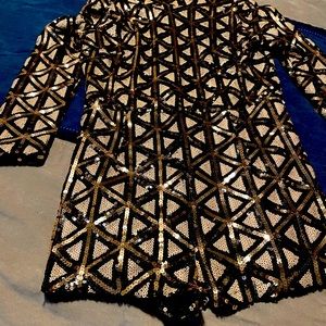 Barely worn romper from Akira. Beautiful figure flattering romper.